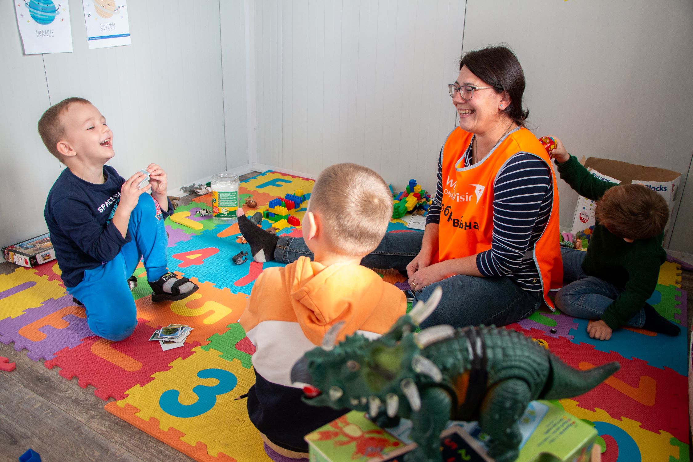 World Vision staff member running a child friendly space for Ukrainian refugee children