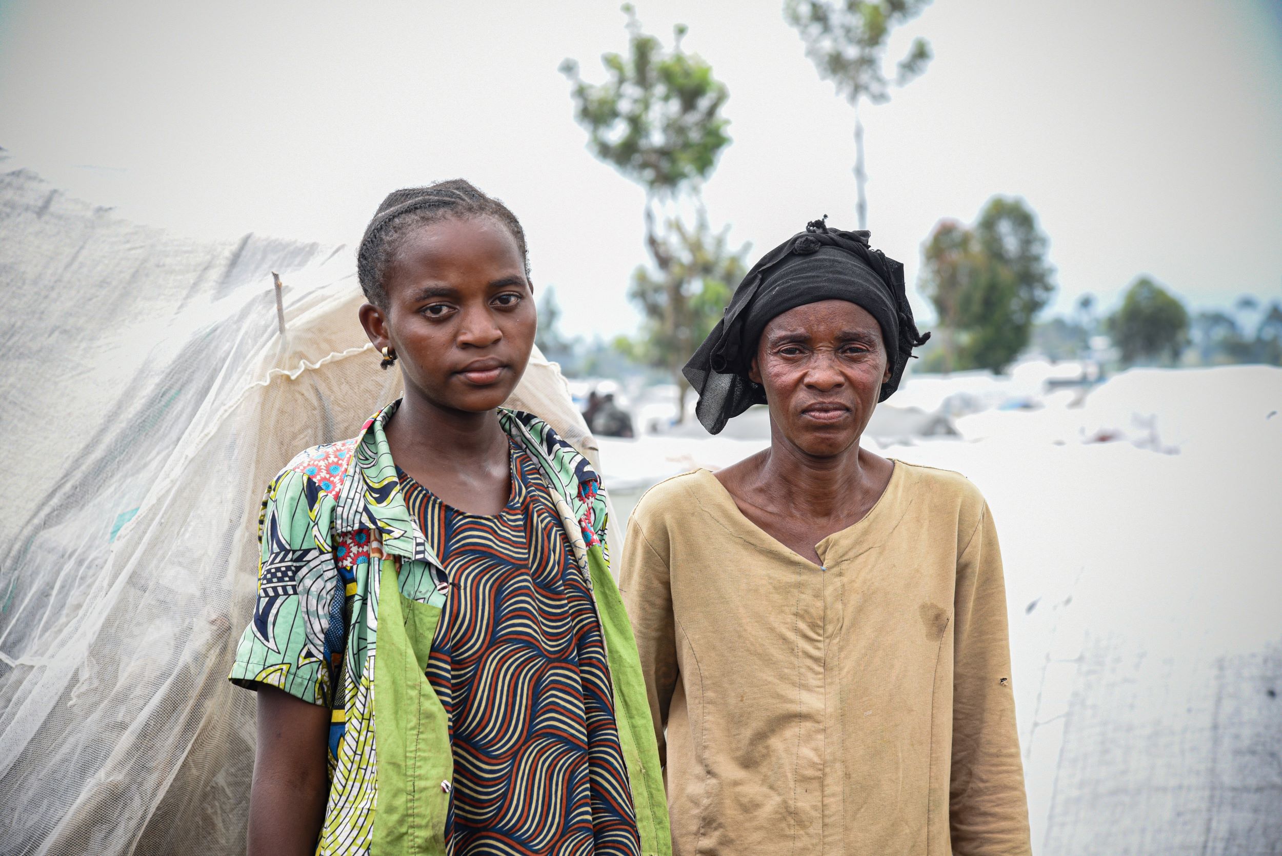 14-year-old internally displaced girl with her mother from the DRC