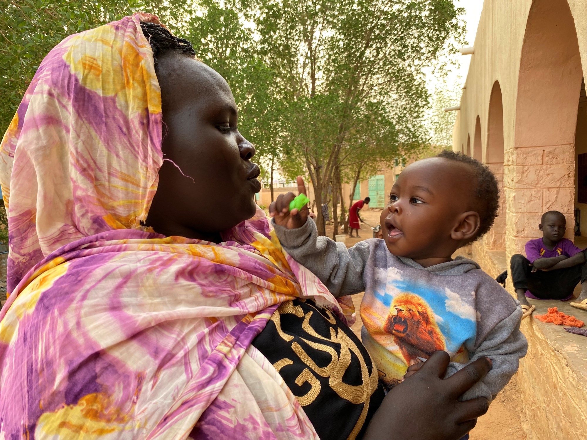 Mother and child in her arms in Sudan