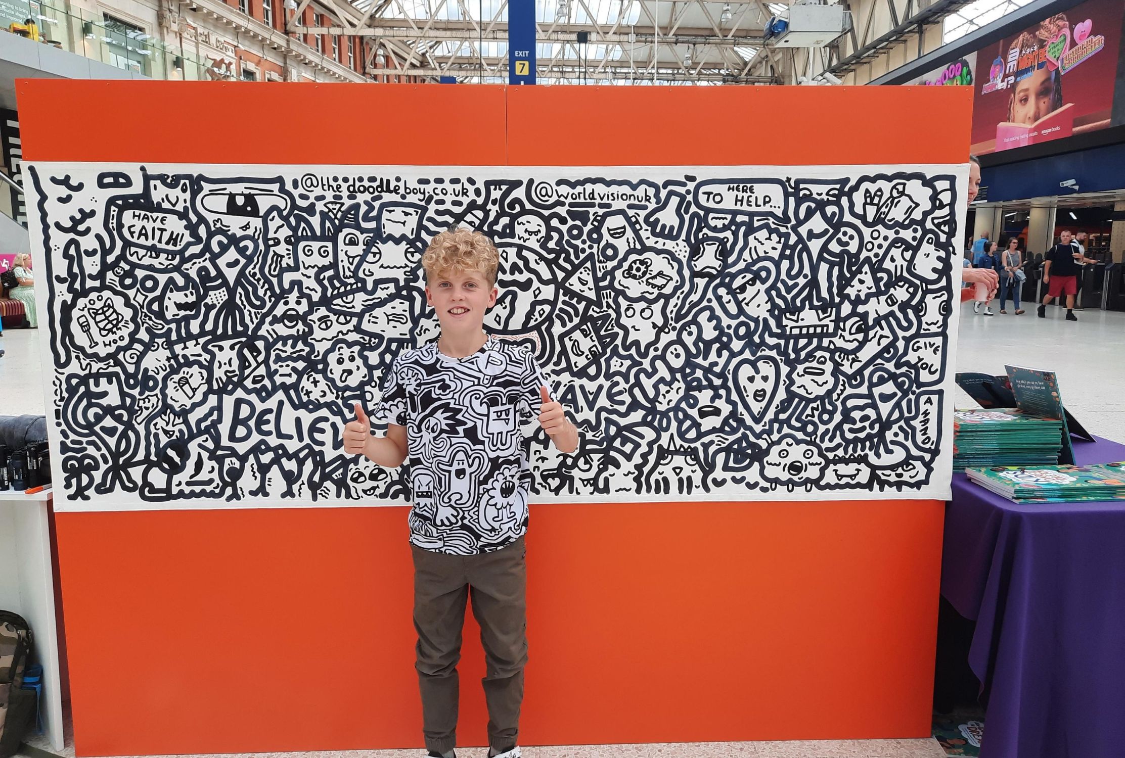 Doodle Boy at Waterloo Station with artwork