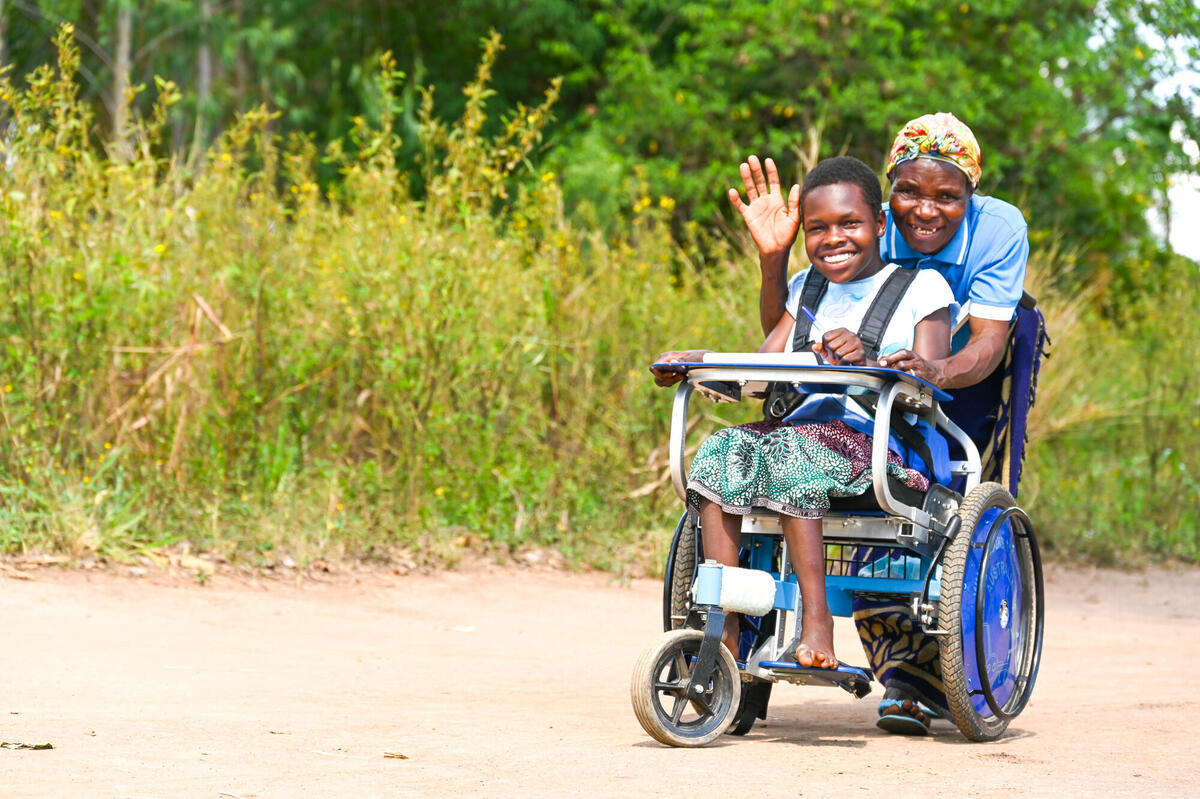 Child in Uganda with her grandmother