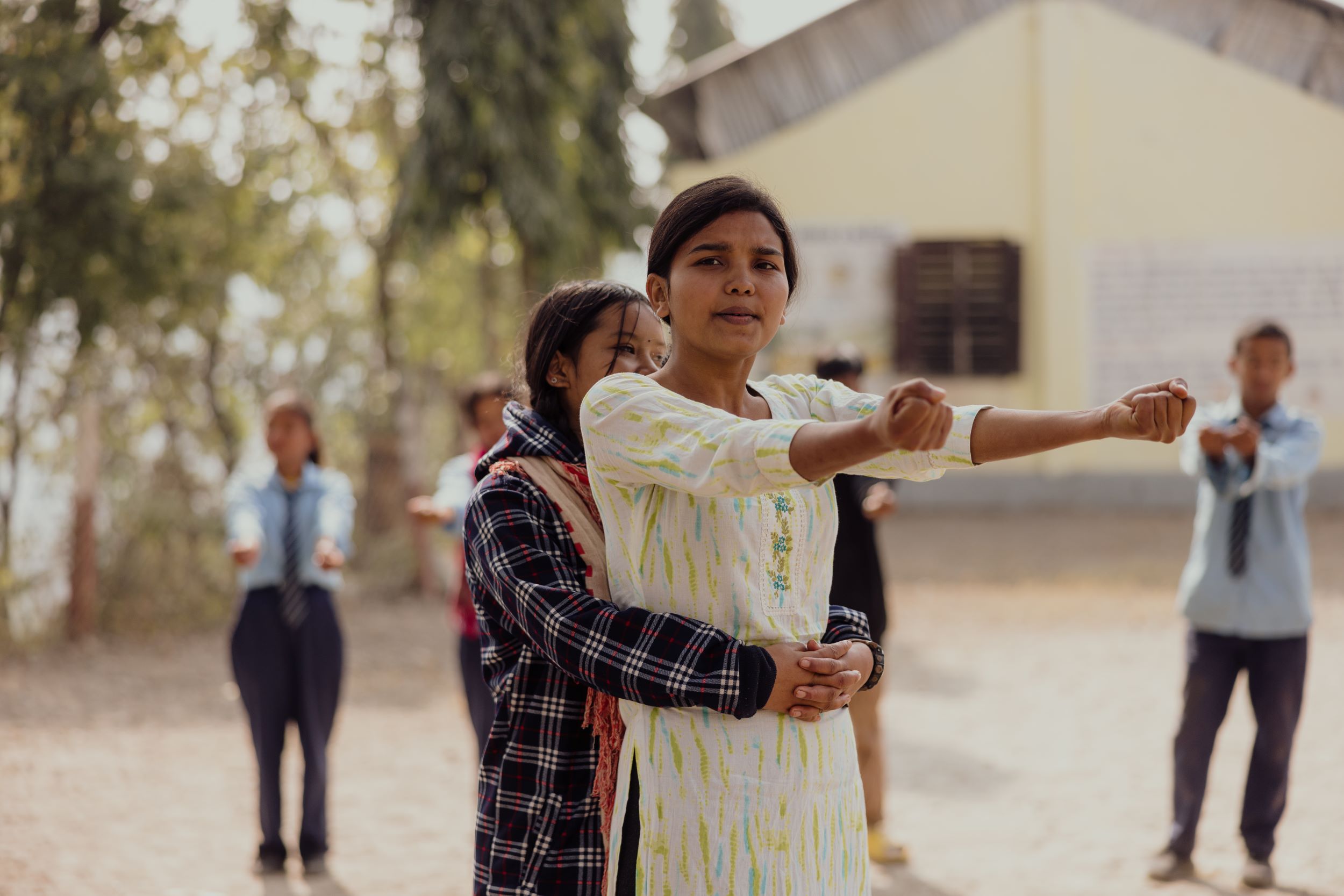 Self defence class - girl with arms outstretched