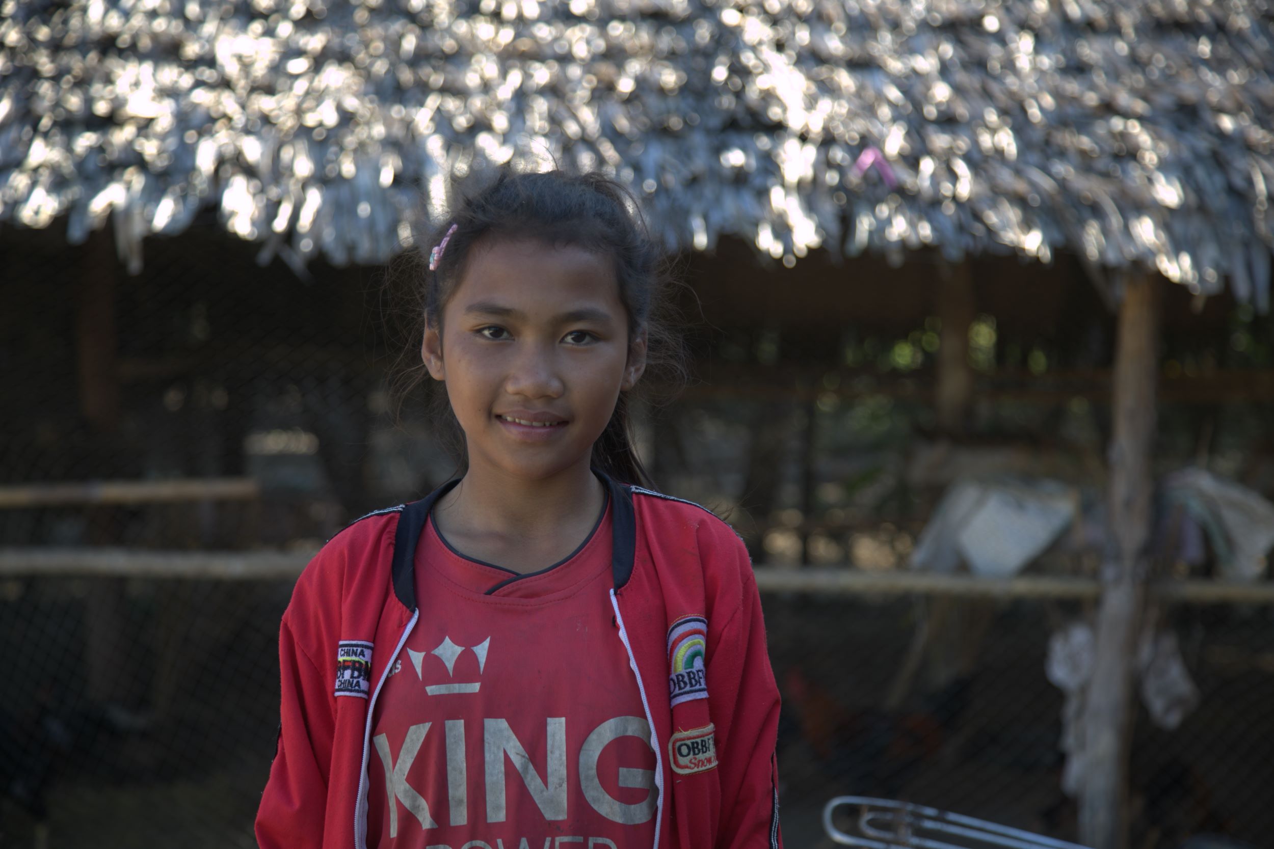 Cambodian girl, 14, smiles because now she can go back to school