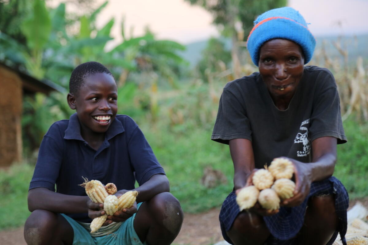 13-year-old Naaman with his mother Pamela on their farm