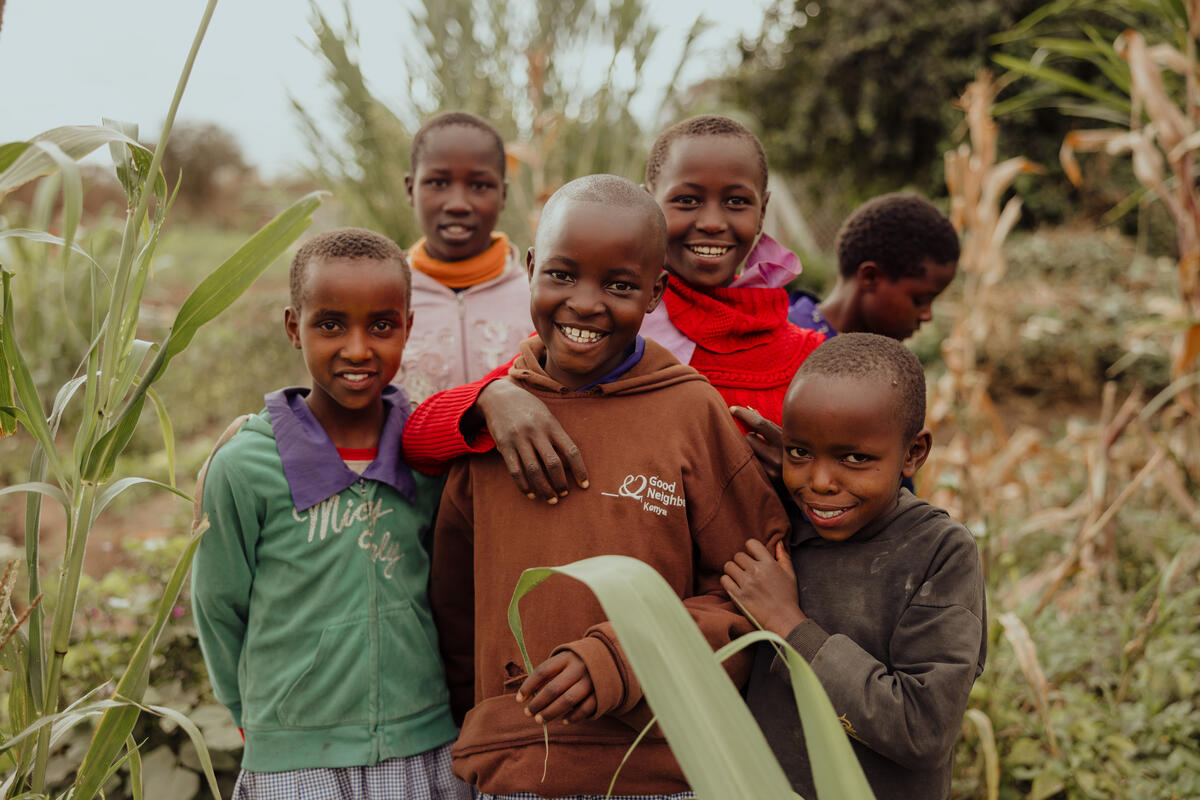 Five Kenyan children smiling at the camera