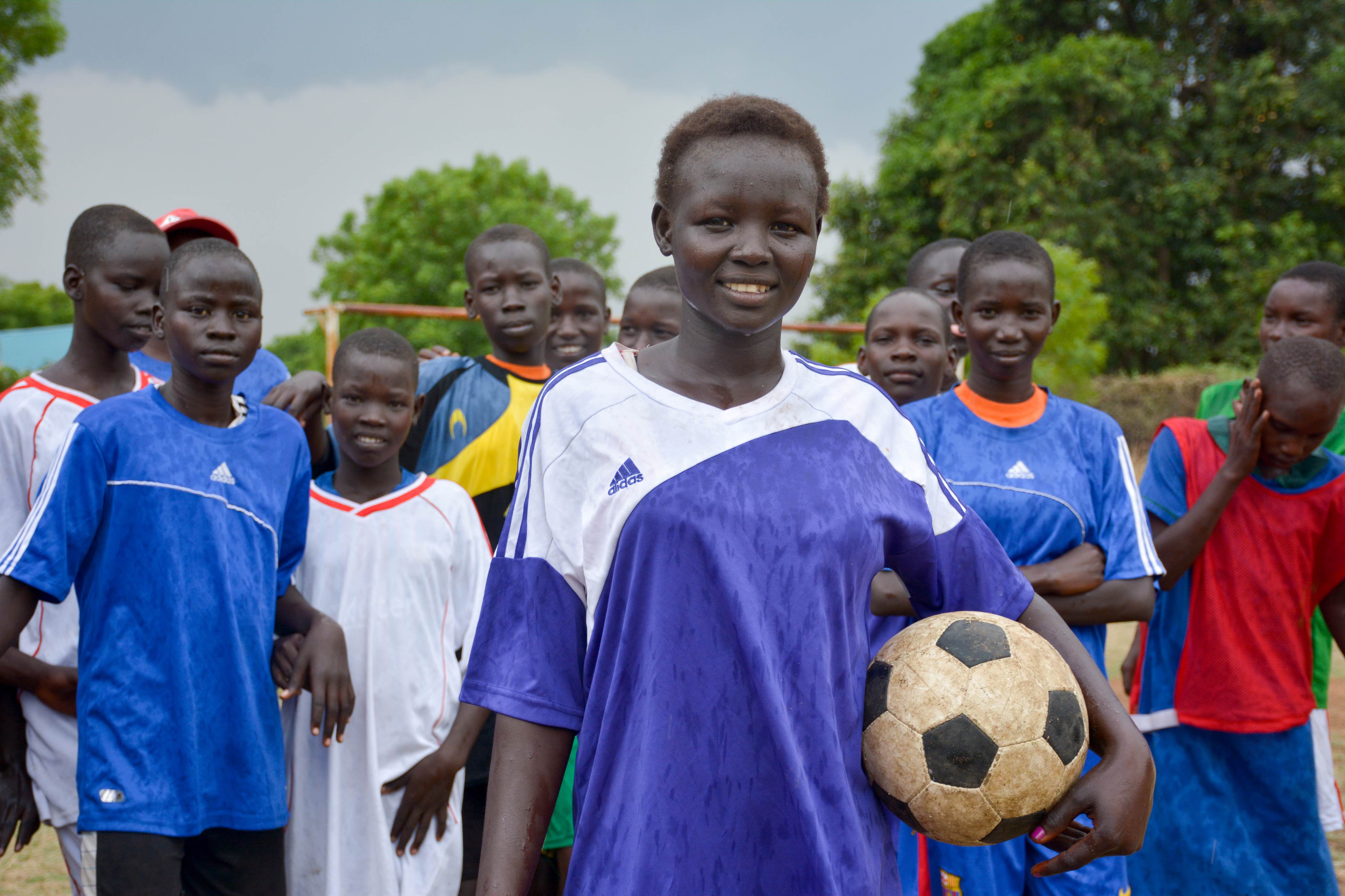 Dina and her football team