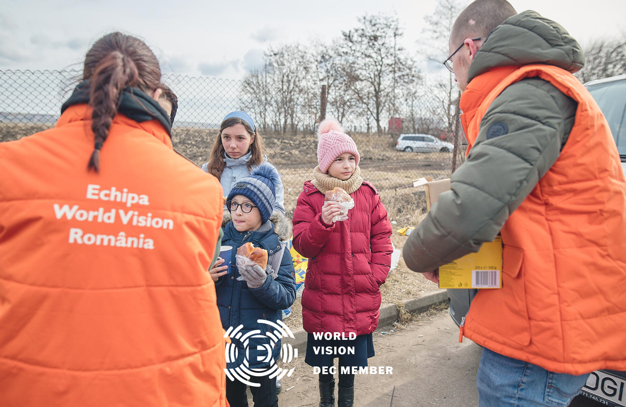 World Vision staff talk to Ukrainian children on the Romania boarder