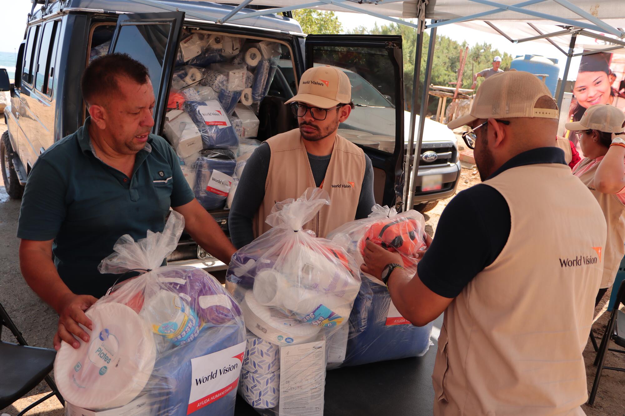 World Vision staff distributing emergency supplies in Venezuela.