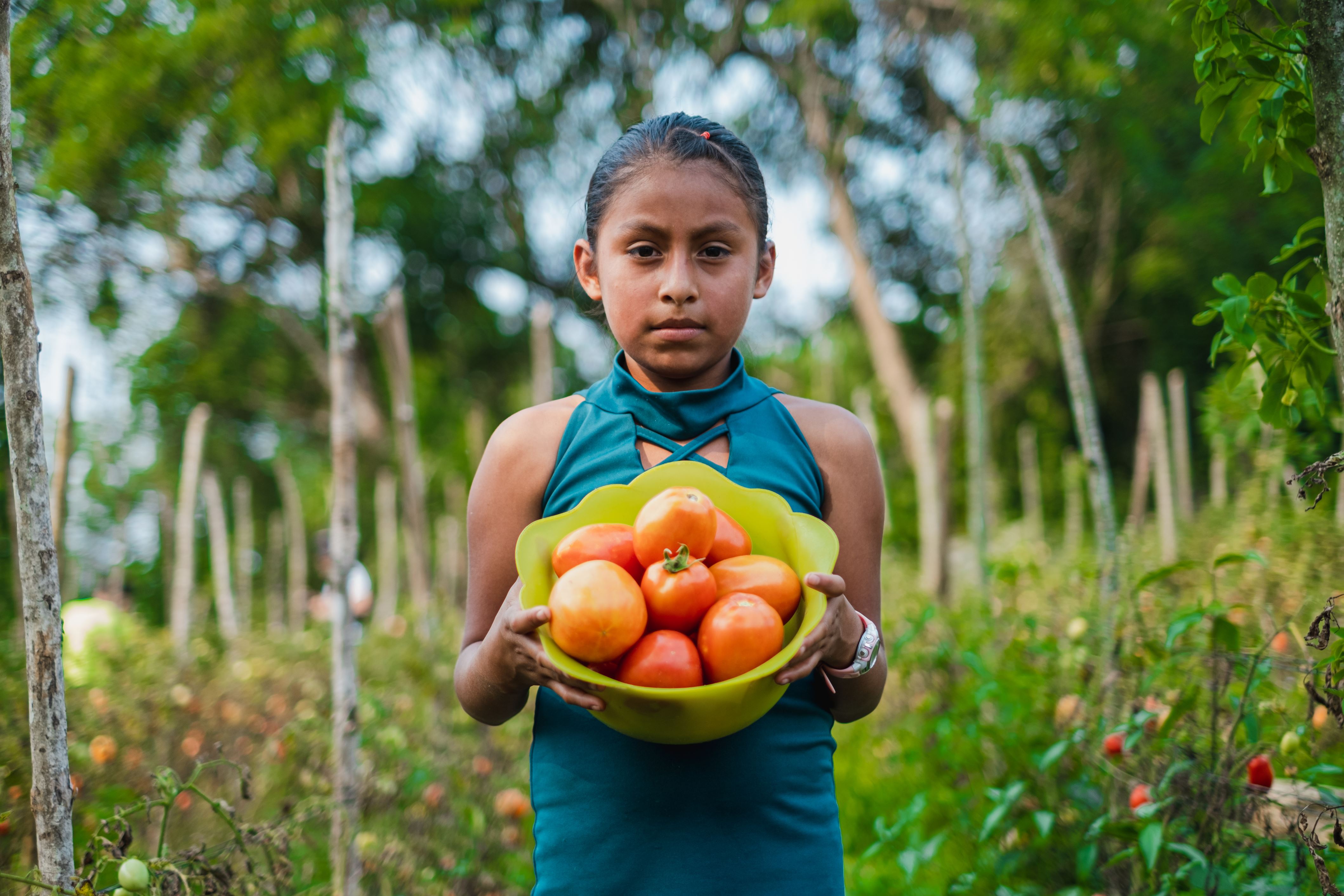 Four children walking through desert