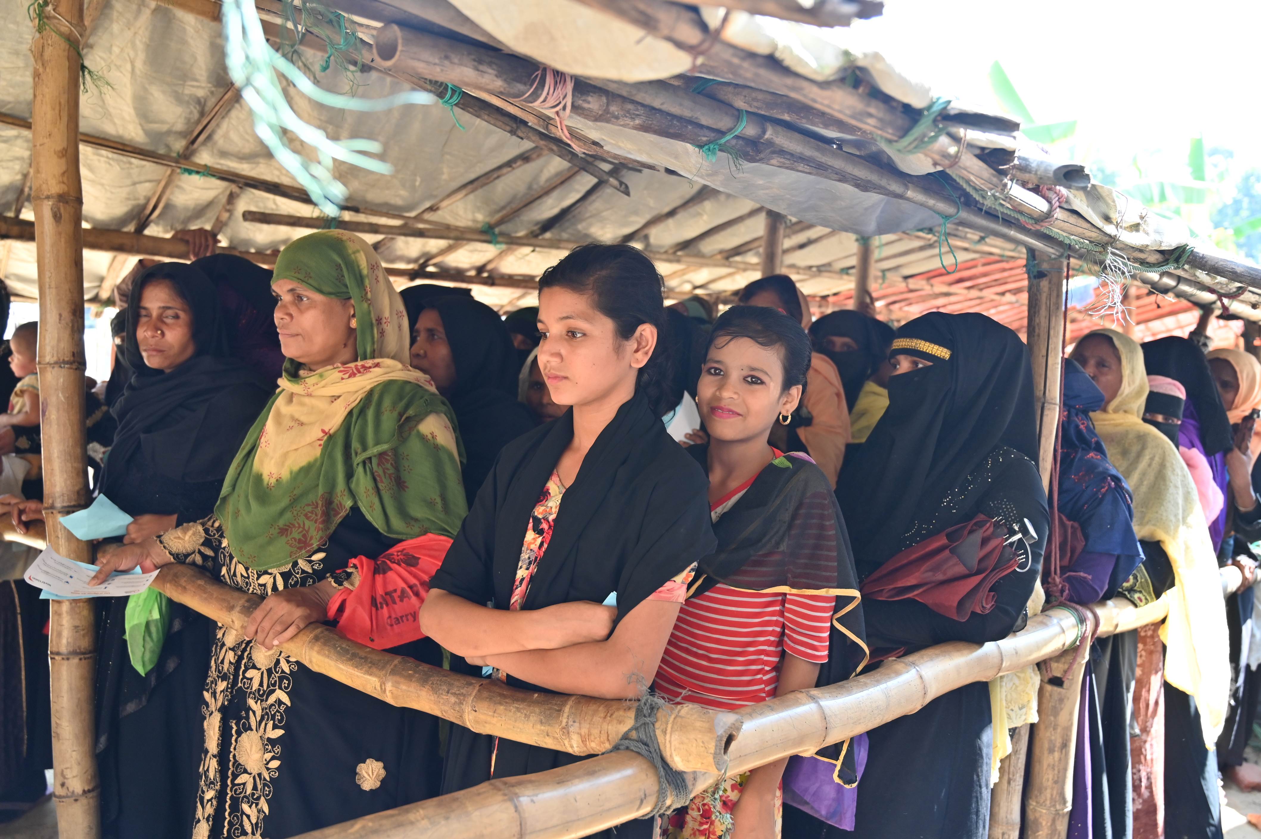 World Vision staff distributes dignity kits for Rohingya women and adolescent girls.