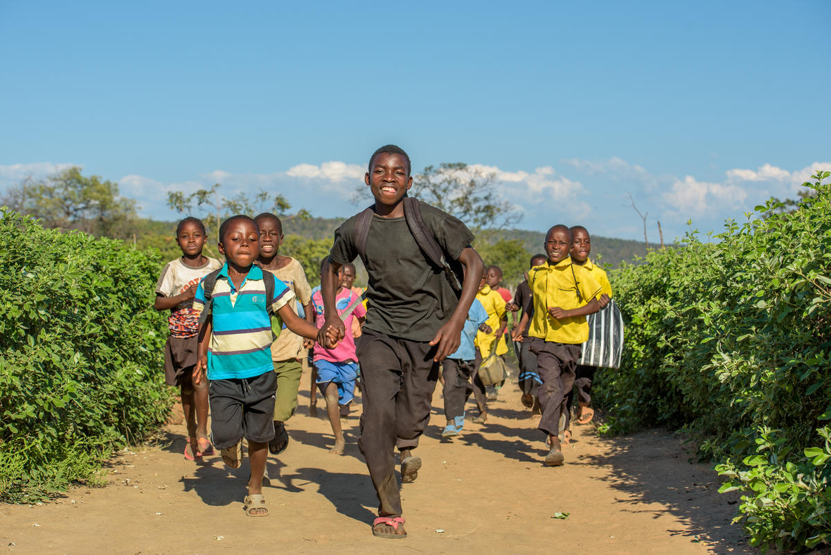 Group of children running together