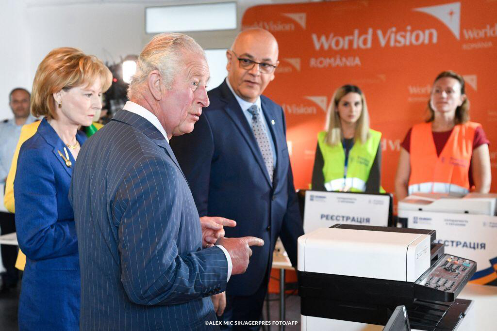 HRH Prince Charles speaks with volunteers helping Ukraine refugees in Bucharest