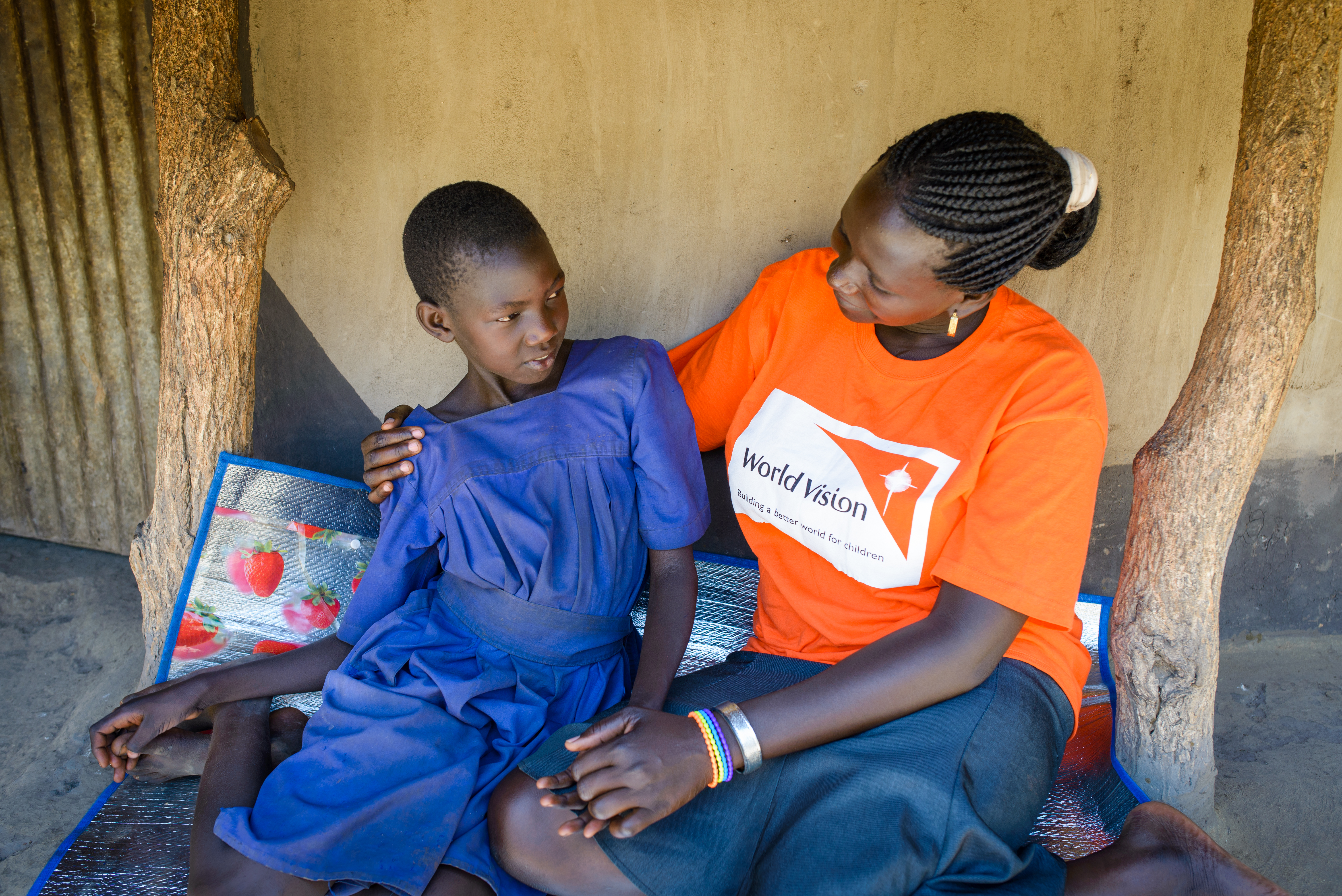 World Vision worker with child