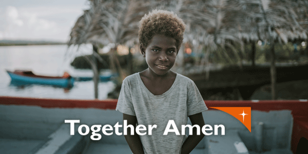 Young boy by coastline affected by climate change in South Pacific islands