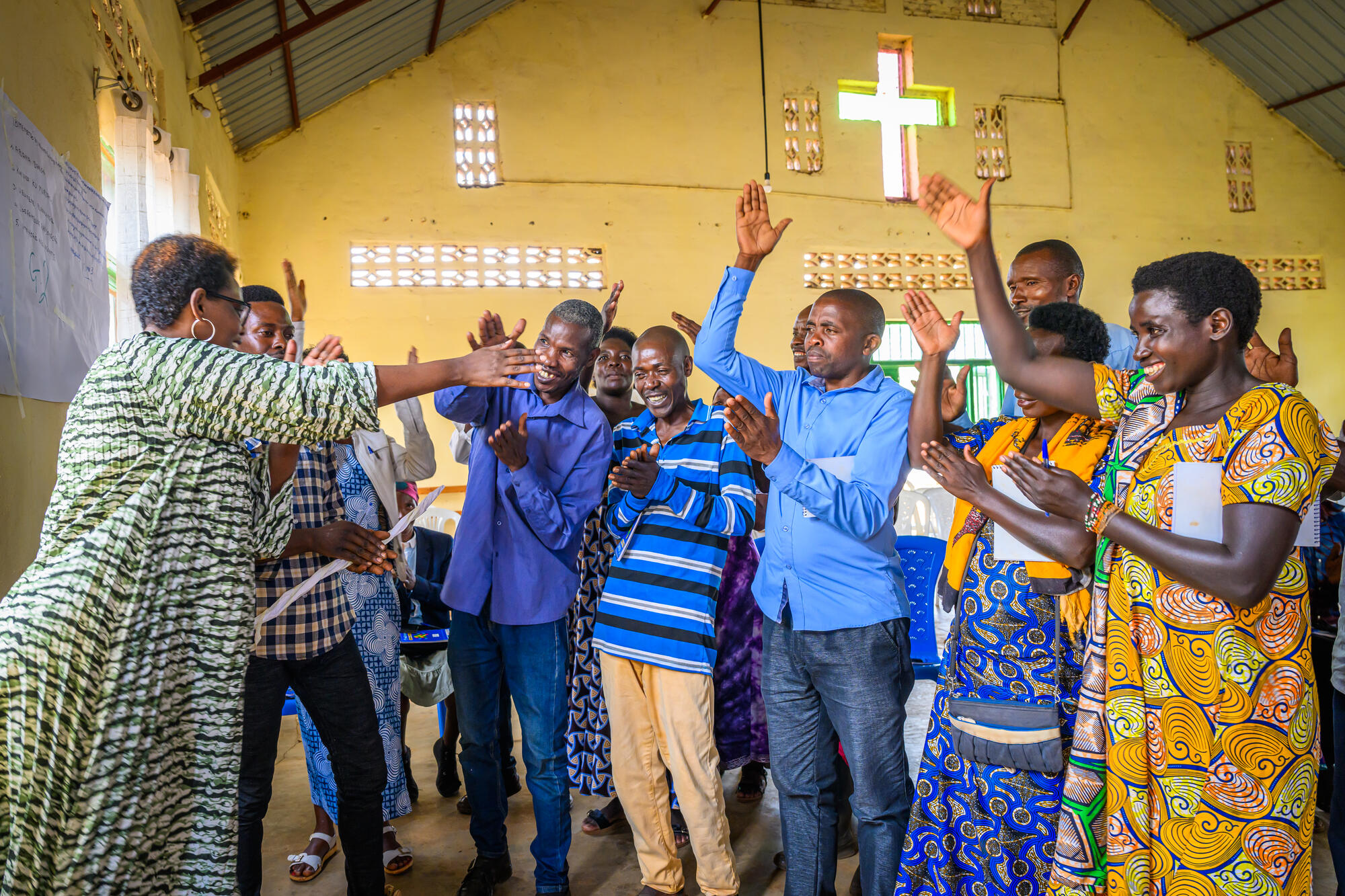 A community worships togethers in Rwanda
