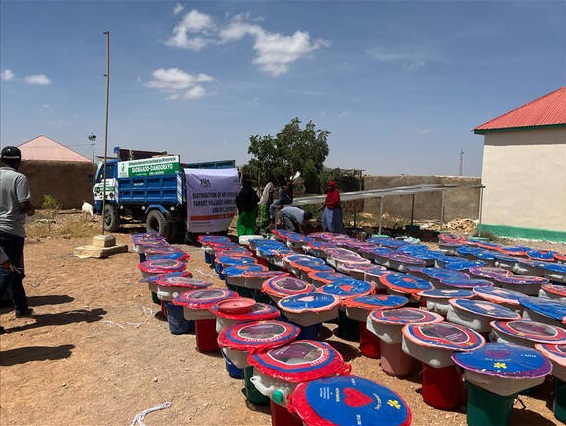 Essentials such as containers for water and mosquito nets ready for distribution