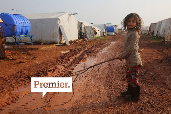 Young child standing in refugee camp in north west Syria – World Vision Believe campaign