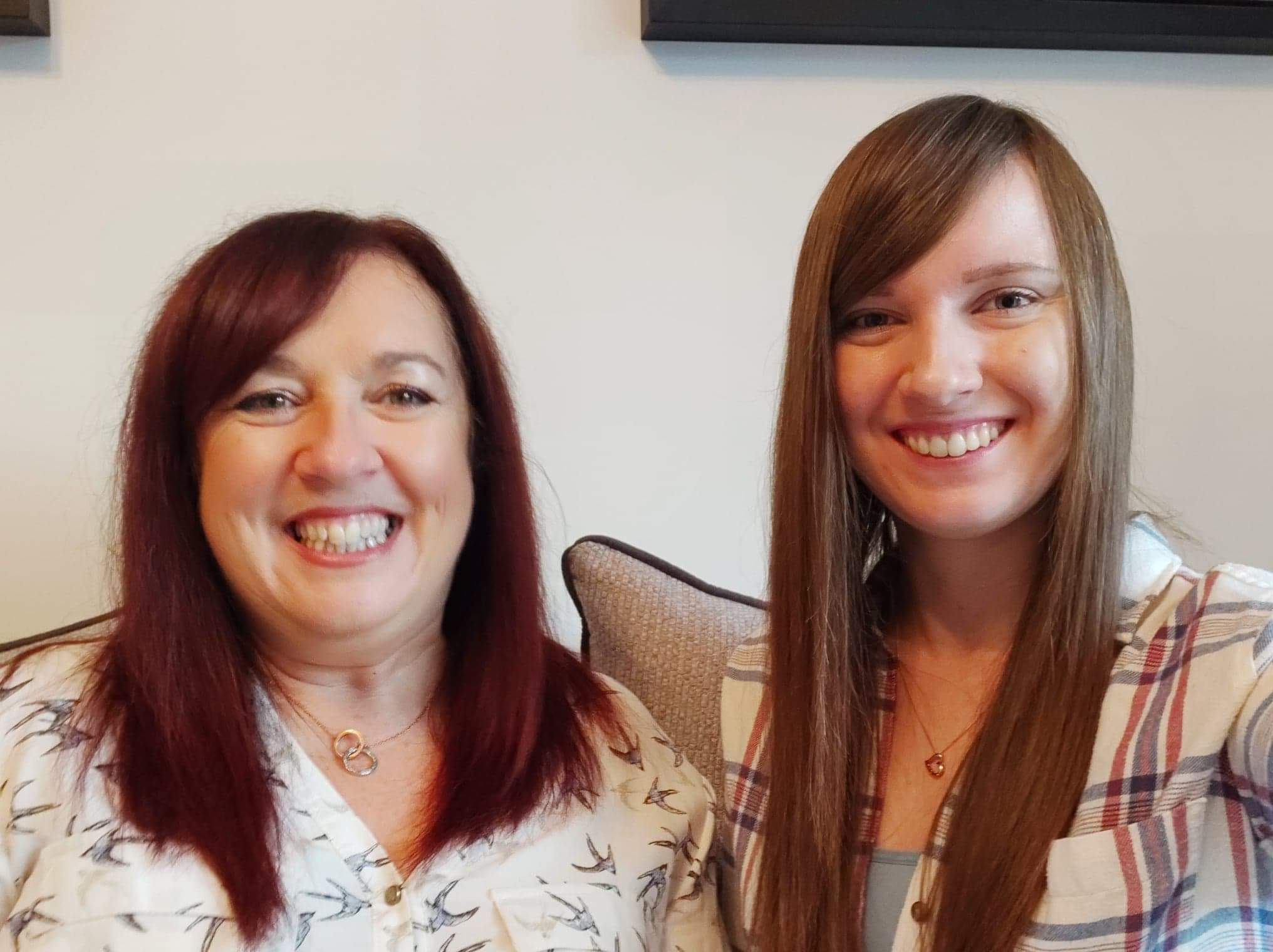 Caroline and Lizzie McLeod wait for their call with sponsored child Odalis