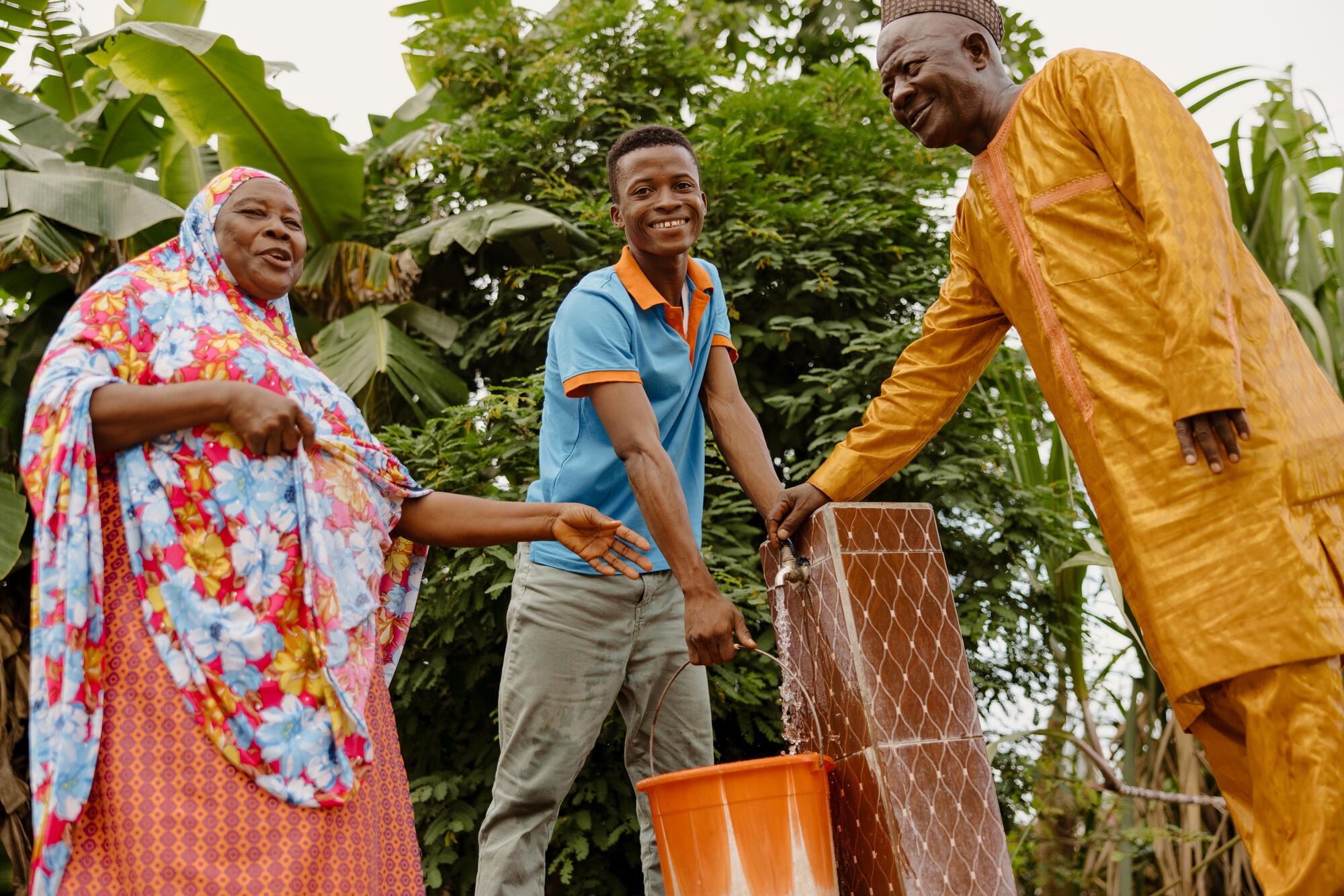 Community members using a borehole