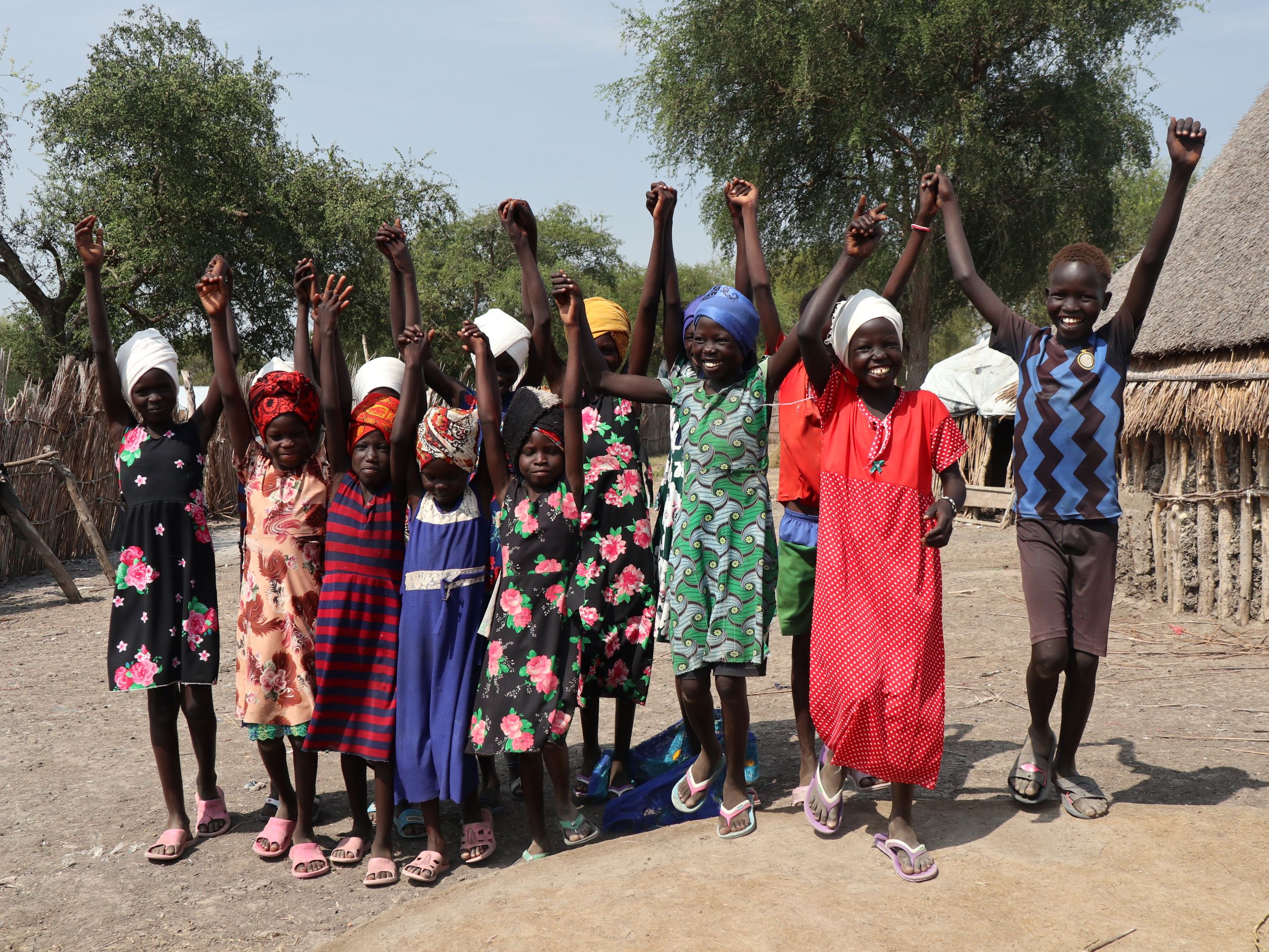 Women holding hands – a sign of peace and coexistence in South Sudan