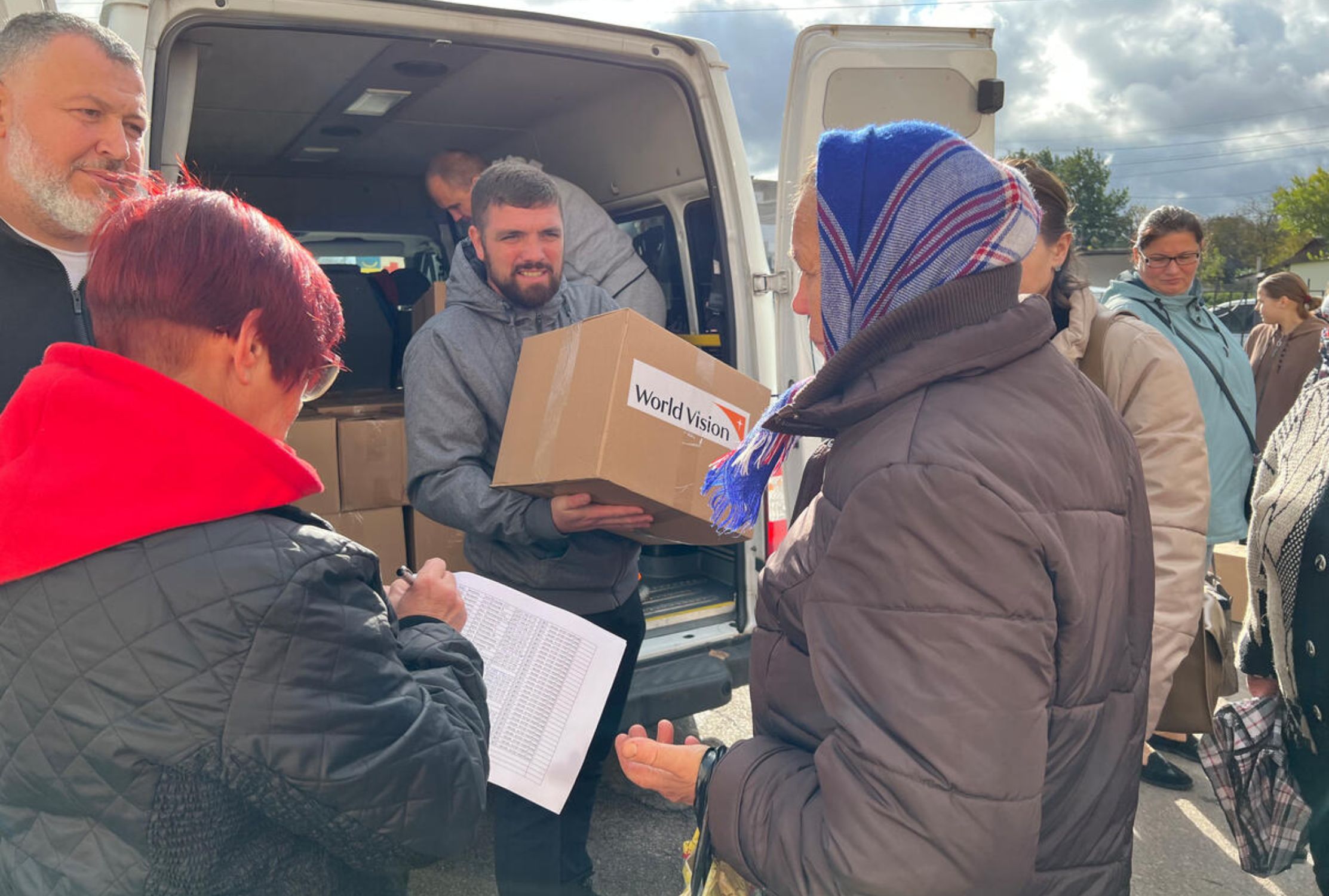 Ukrainian refugees receiving food from World Vision
