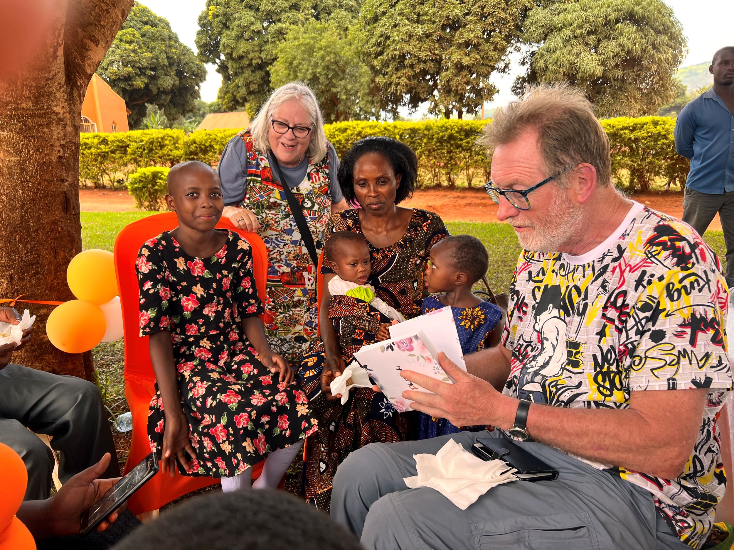 Uganda, sponsored child and family meet child sponsors