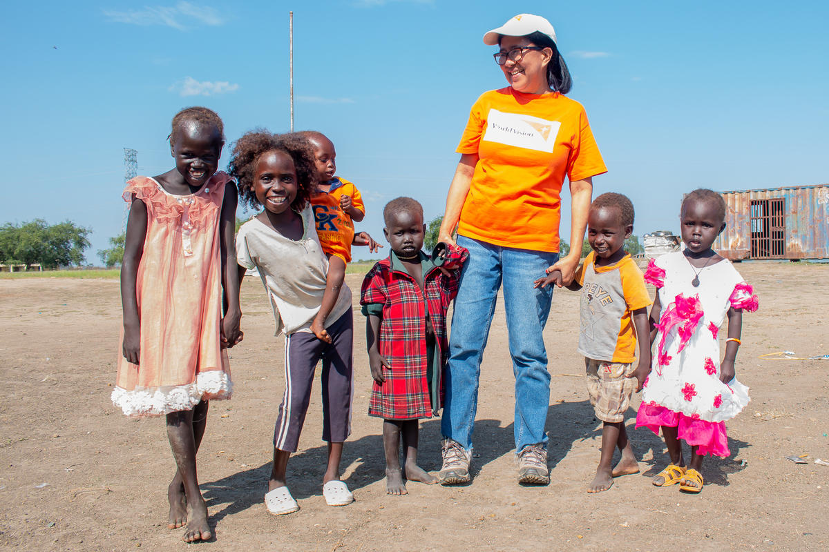World Vision colleague with 6 small children
