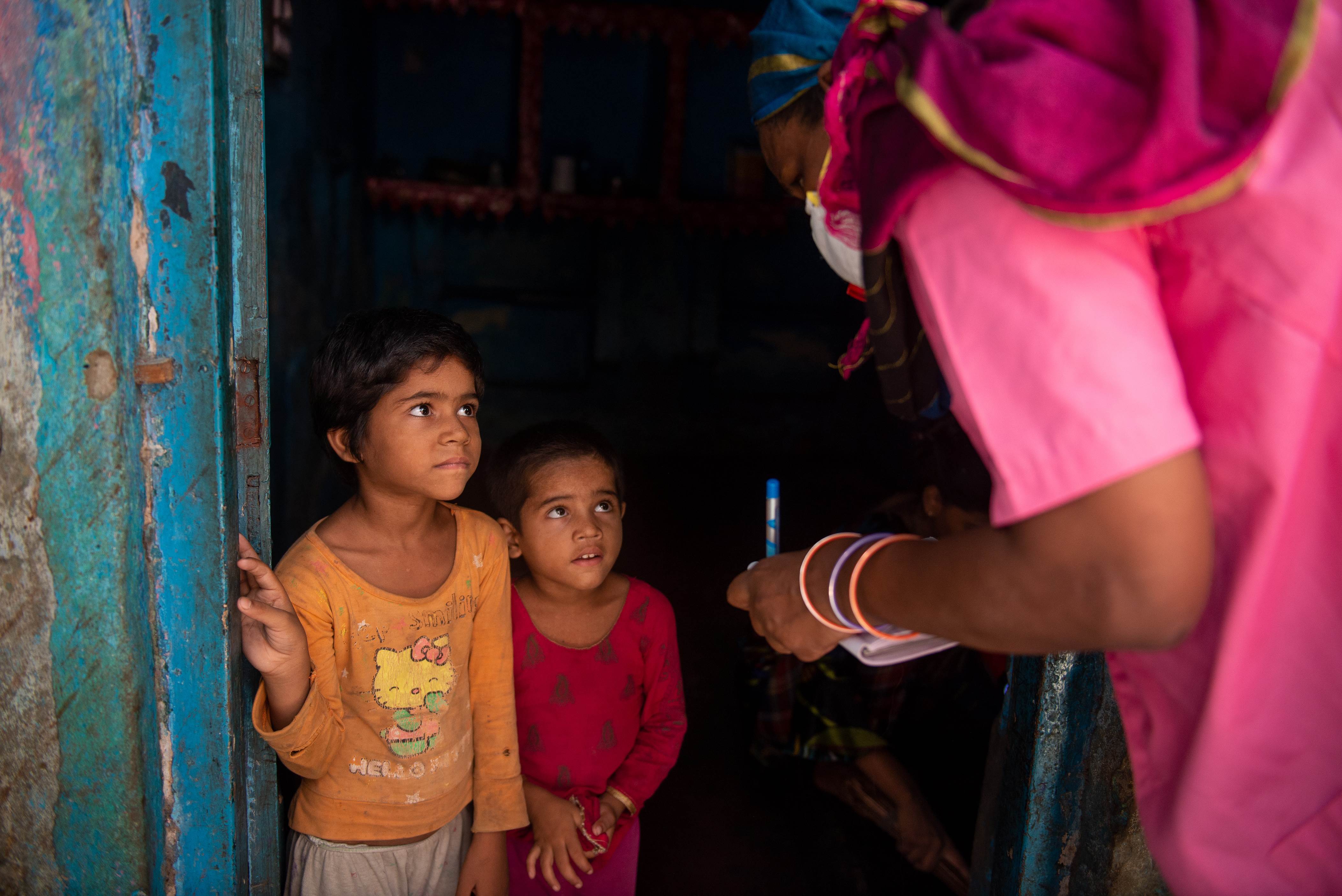 Shiv Kumari, 42, on one of her routine visits to the community.