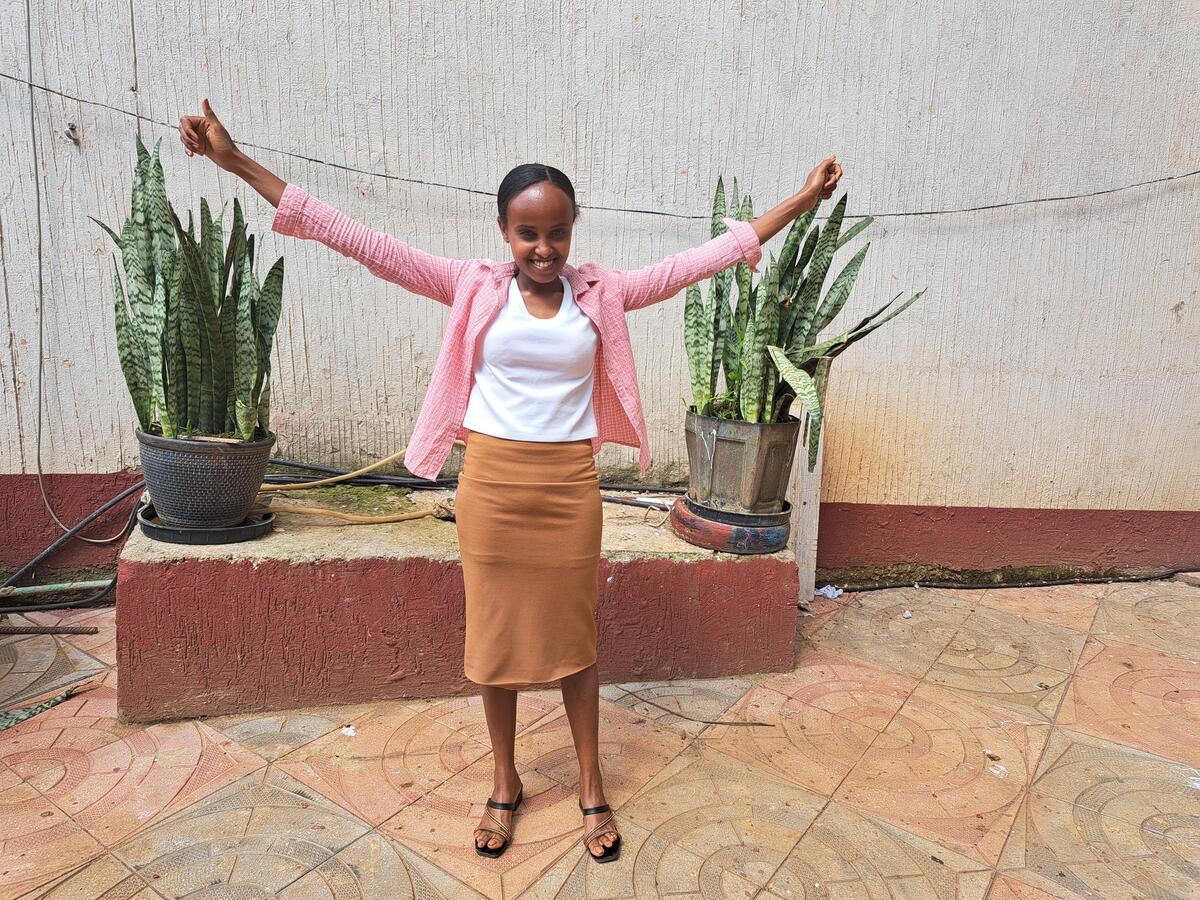 Girl from Ethiopia smiles at camera