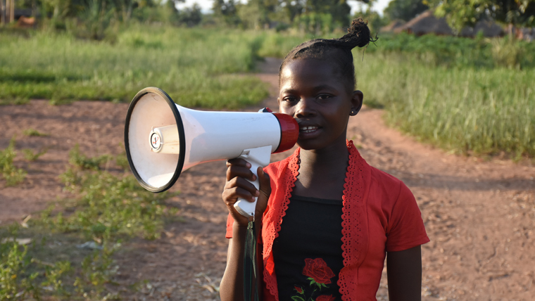 Priscillia with a megaphone