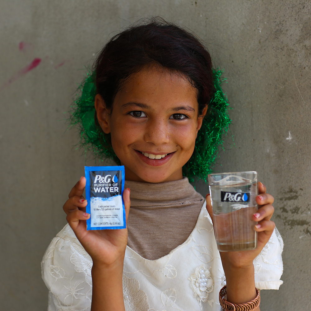 Girl holding two elements to purification kit